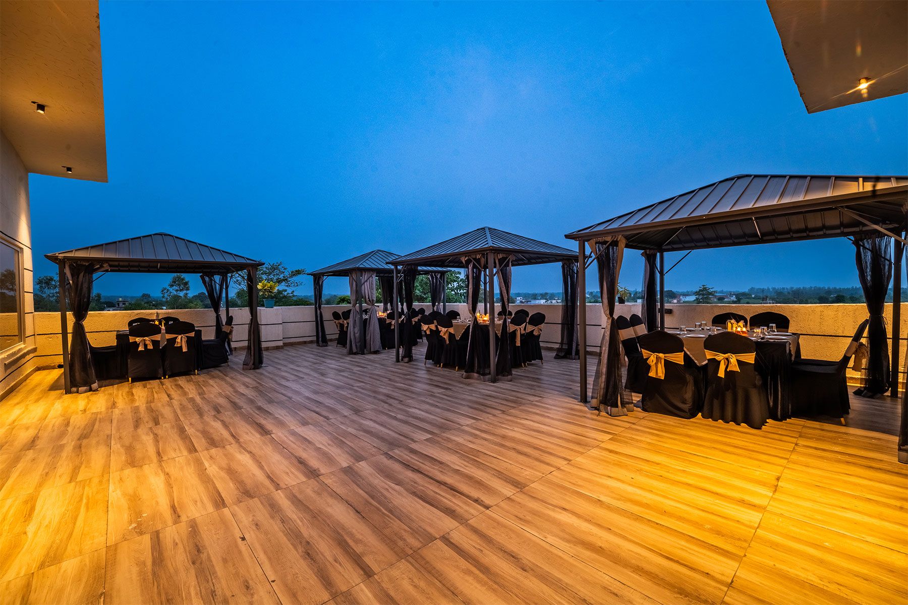 Alfresco rooftop restaurant at Leafylush Resort, Ramnagar
